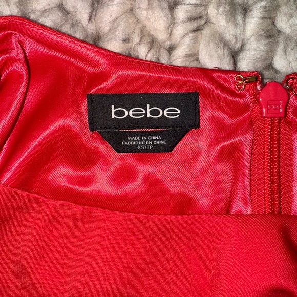 BEBE-MINI COCKTAIL PENCIL DRESS WITH PEPLUM AND CUT OUT - Picture 4 of 4